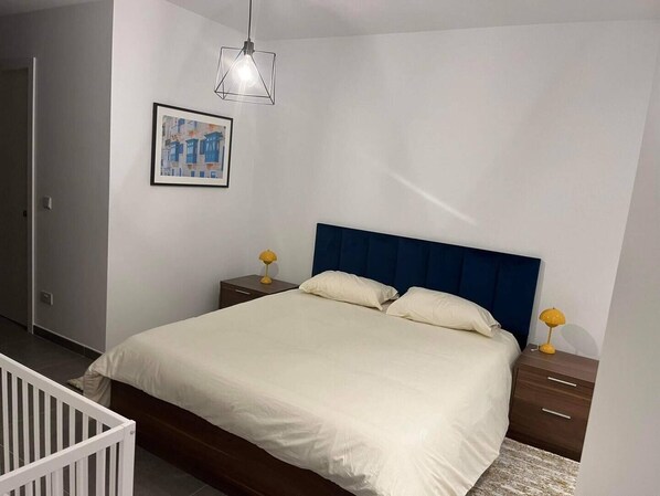 2 bedrooms, desk, iron/ironing board, travel crib