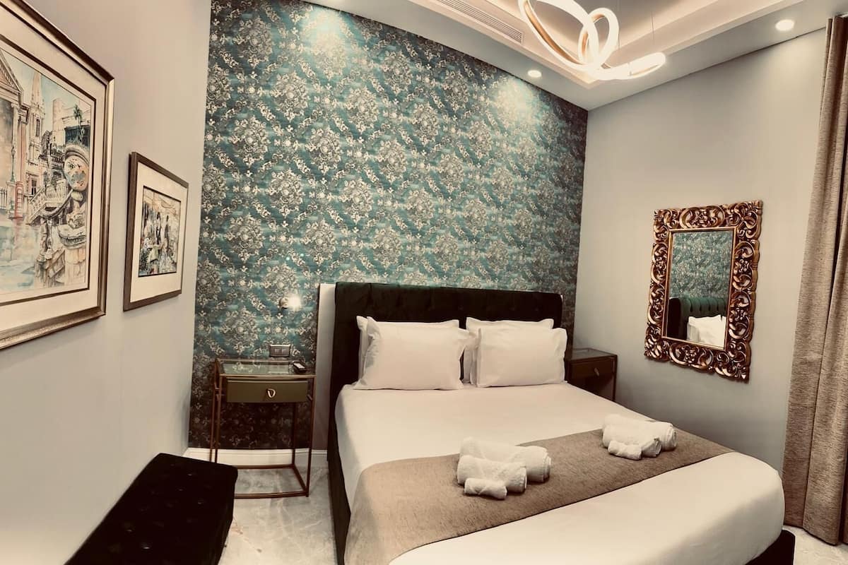 Superior Double Room, 1 Queen Bed | Minibar, in-room safe, desk, laptop workspace