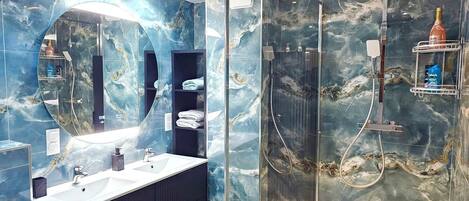 Shower, hair dryer, towels, soap
