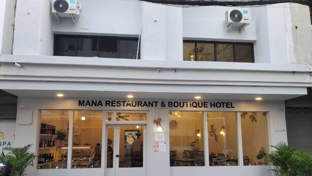 A building with a sign reading "MANARA RESTAURANT & BOUTIQUE HOTEL". - Mana restaurant and boutique hotel (Khon Kaen)