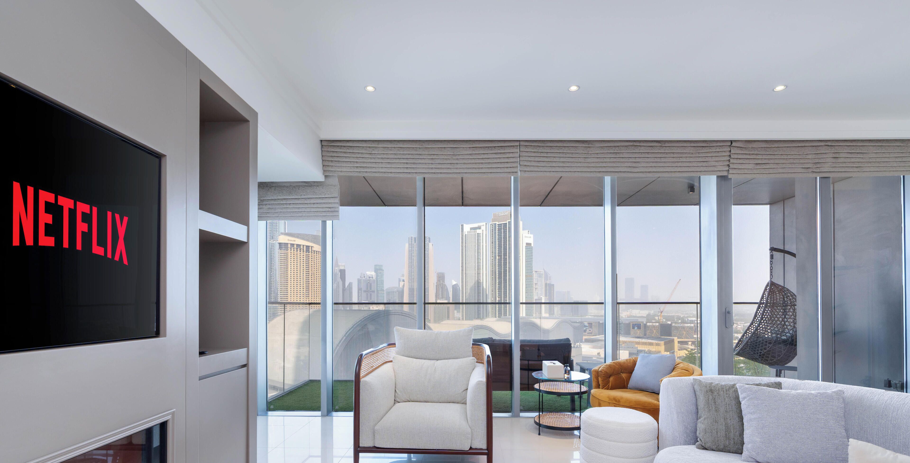 2-Bedroom Apartment with Panoramic Burj Khalifa and Fountain View | Living area | Flat-screen TV
