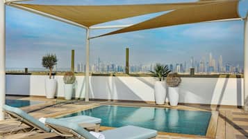 Outdoor pool, pool umbrellas, pool loungers