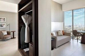 Club King Suite with Skyline View - Club Level | In-room safe, desk, laptop workspace, blackout drapes - Hotel Local Dubai, Jumeirah Village Triangle, Autograph Collection (Dubai)
