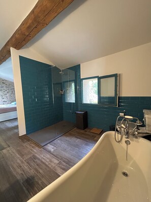 Shower, hair dryer, towels, toilet paper