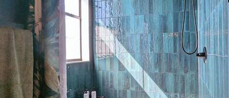 Shower, hair dryer, towels, soap