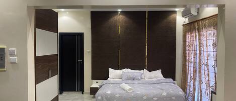 1 غرفة نوم وملاءات أسرّة