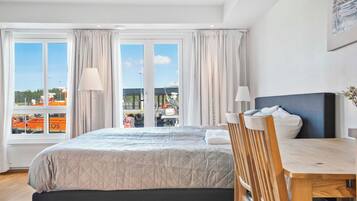 Deluxe Apartment, Harbor View | 2 bedrooms, blackout drapes, soundproofing, iron/ironing board