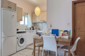 Basic Apartment, 1 Queen Bed with Sofa bed, Balcony, Beachfront | Private kitchen | Electric kettle - Alisahni Home 2 (Chania)