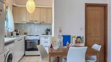 Basic Apartment, 1 Queen Bed with Sofa bed, Balcony, Beachfront | Dining room