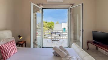 Basic Apartment, 1 Queen Bed with Sofa bed, Balcony, Beachfront | 1 bedroom, soundproofing, iron/ironing board, free WiFi