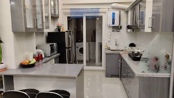 Standard Room | Shared kitchen | Full-sized fridge, microwave