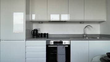 Standard Apartment | Private kitchen | Fridge, oven, electric kettle, cookware/dishes/utensils