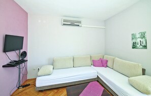 Apartment (Two Bedroom Apartment 2) | Living room | 32-inch flat-screen TV with cable channels