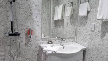 Standard Double Room | Bathroom | Shower, free toiletries, towels, soap