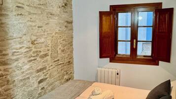 2 dormitorios, tabla de planchar con plancha, wifi y ropa de cama