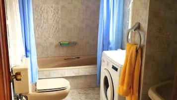 Hair dryer, bidet, towels, soap