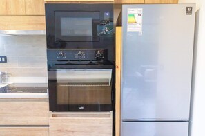 Refrigerador, microondas, horno, placa de cocina