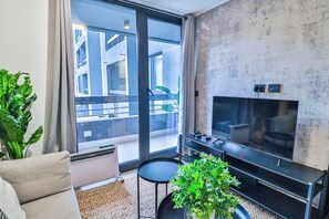 TV, offices - HOM I Depto 1D1B Parking + Piscina Temperada (Puerto Varas)