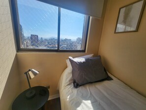 2 habitaciones, tabla de planchar con plancha, wifi y ropa de cama