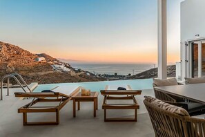 Outdoor dining - Gorgeous Villa • 5BR • Pool, 2 Jacuzzis • Sea View • 600m. from Elia Beach (Mykonos)
