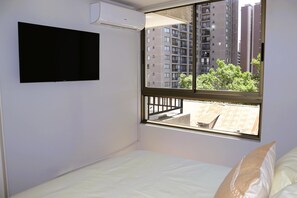 1 dormitorio, tabla de planchar con plancha, wifi y ropa de cama