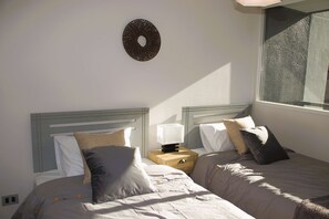 2 bedrooms, iron/ironing board, WiFi, bed sheets