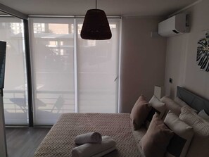 1 habitación, tabla de planchar con plancha, wifi y ropa de cama 