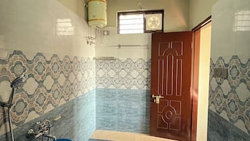 Deluxe Double Room, Balcony, Mountain View | Bathroom | Shower, slippers, towels, soap