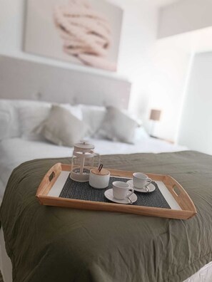 1 habitación, tabla de planchar con plancha, wifi y ropa de cama 