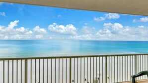 A balcony with a view of the ocean and a clear sky. - Majestic Beach Towers 2-801 (Panama City Beach)