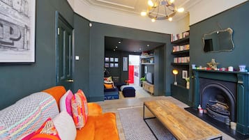 House (4 Bedrooms) | Living area | TV, fireplace