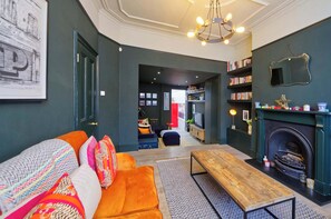 House (4 Bedrooms) | Living area | TV, fireplace