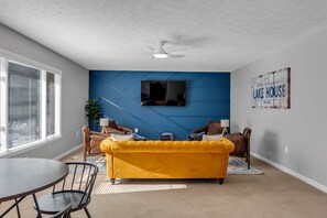 TV, fireplace, books, offices