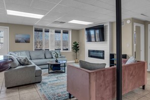 TV, fireplace, books, offices