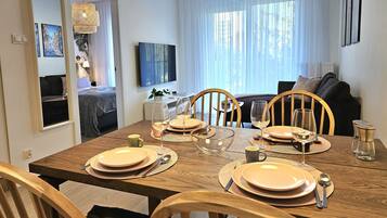 Comfort Apartment, Balcony | Living area | LCD TV