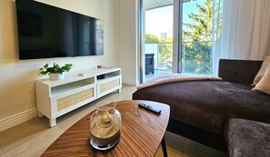 Lägenhet Comfort - balkong | Vardagsrum | LCD-tv