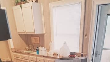 Shower, towels, soap, toilet paper