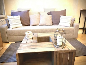 Deluxe Apartment | Living area | TV