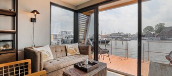 Houseboat Smuk, enjoy from your own outdoor terrace and water views.