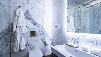 Luxury Studio, Balcony, City View | Bathroom | Shower, hair dryer, bathrobes, towels