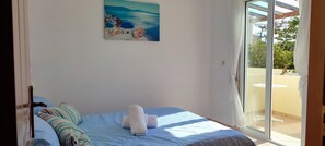 2 bedrooms, desk, iron/ironing board, travel crib