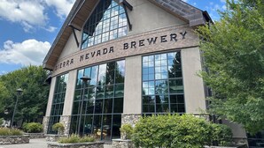 A modern building with a sign reading "Sierra Nevada Brewery".