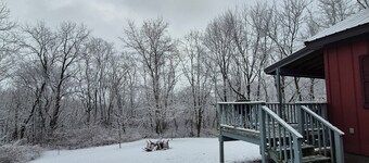 Tranquil red cabin at River Rail Retreats at palisades