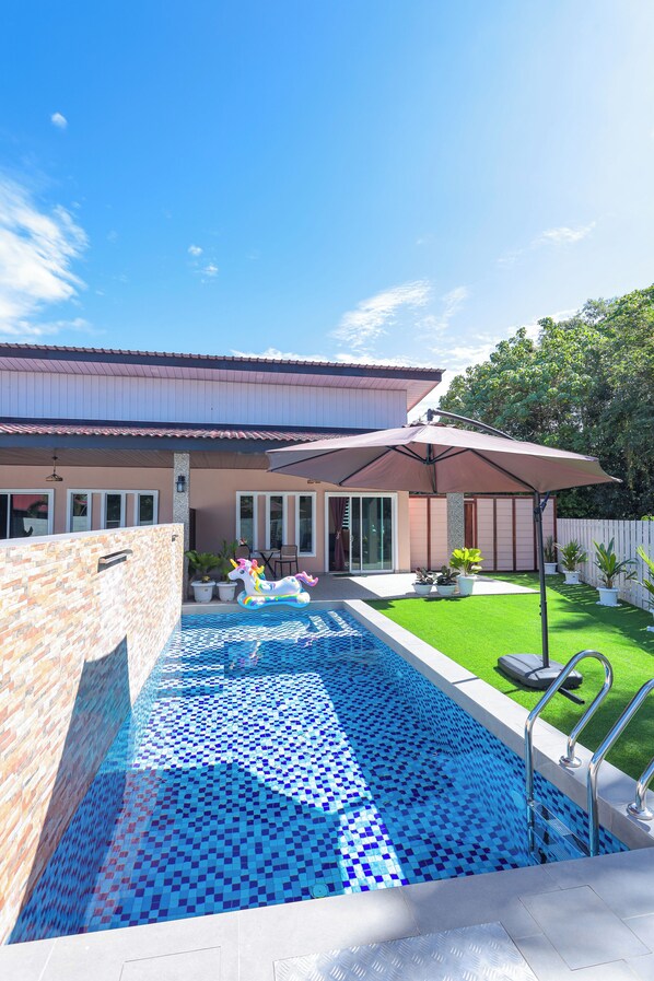 Outdoor pool, pool umbrellas, pool loungers