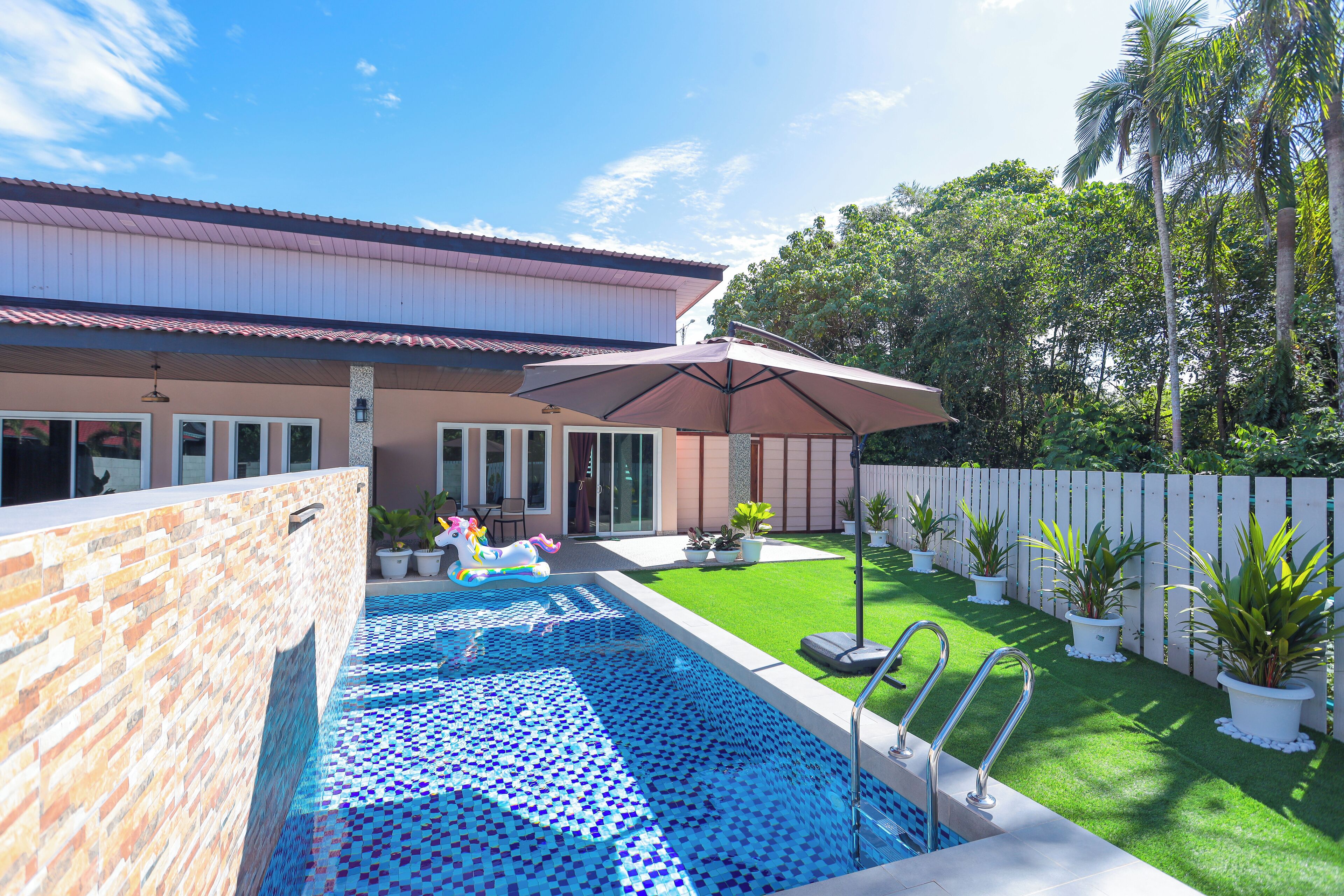 Outdoor pool, pool umbrellas, pool loungers