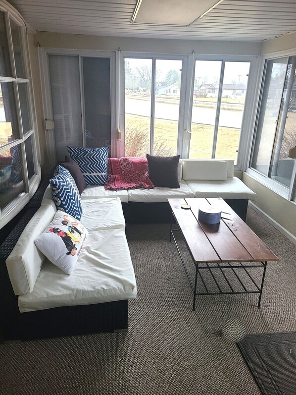 Smart TV, fireplace, books, printers