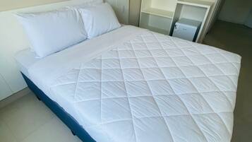 Habitación doble Deluxe, vista a la ciudad | Wifi gratis y ropa de cama