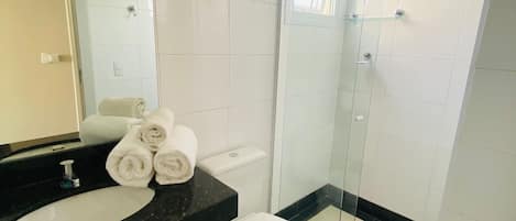 Hair dryer, towels, soap, shampoo