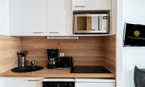 Fridge, microwave, dishwasher, coffee/tea maker