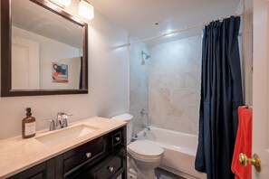 Hair dryer, towels, soap, shampoo